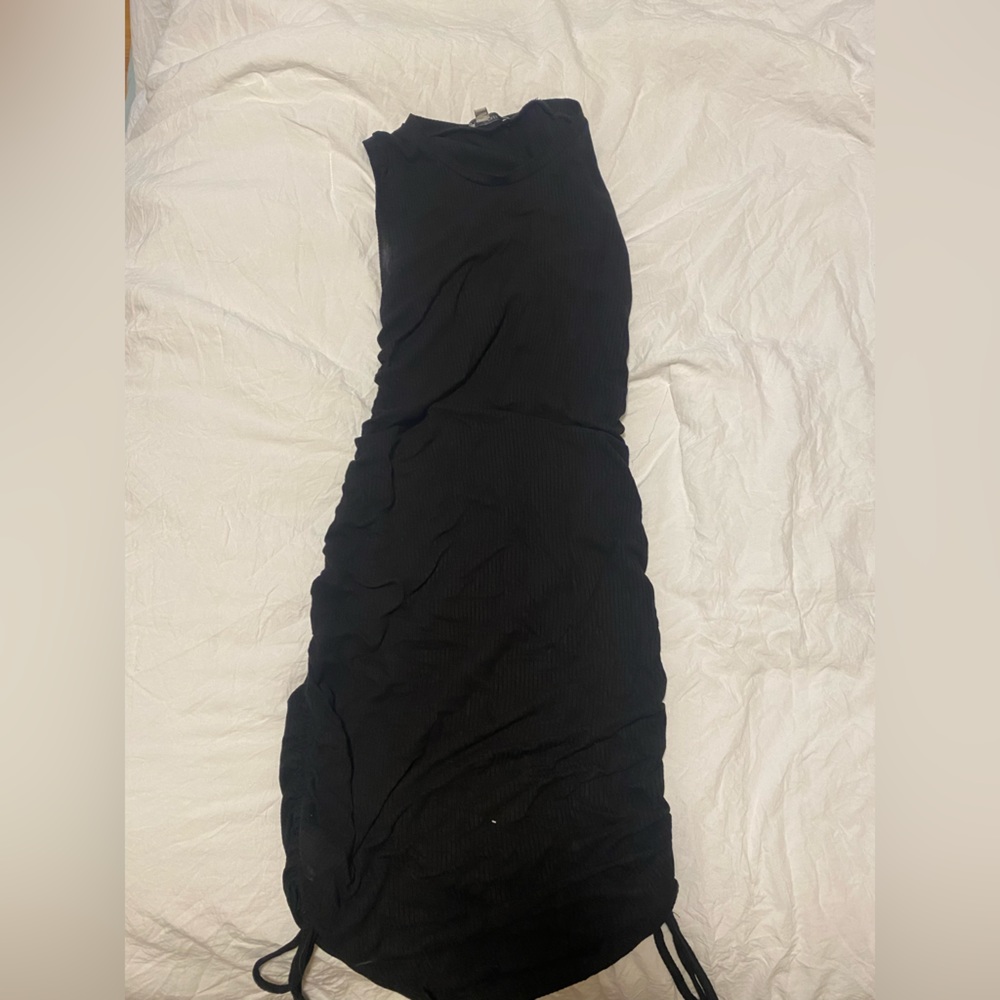 Sleeveless dress with side ties